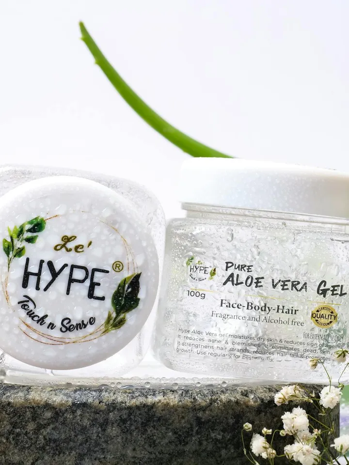 Two jars of aloe vera gel on a clean white surface