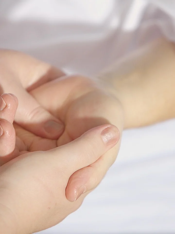 Close-up of hands with smooth skin, conveying skincare and treatment.